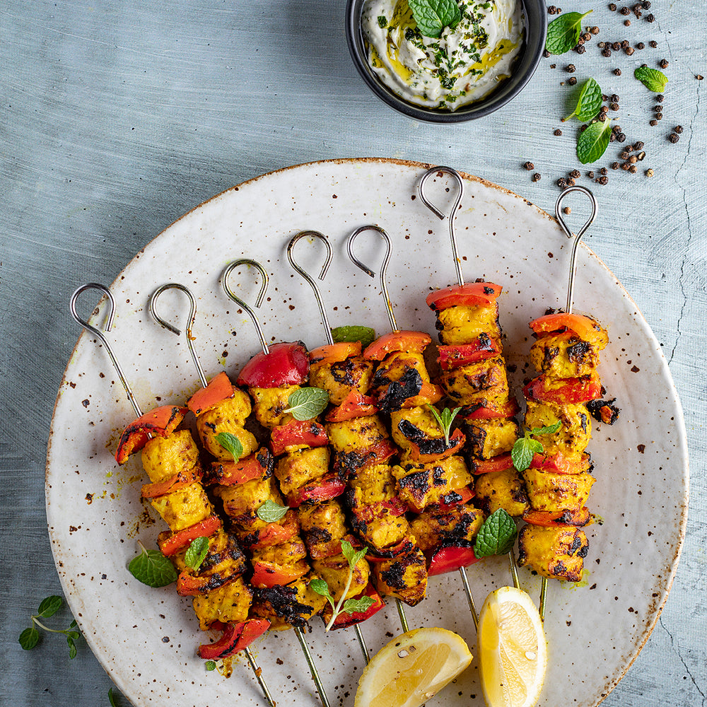 Turmeric, black pepper chicken kebabs with quinoa tabouli