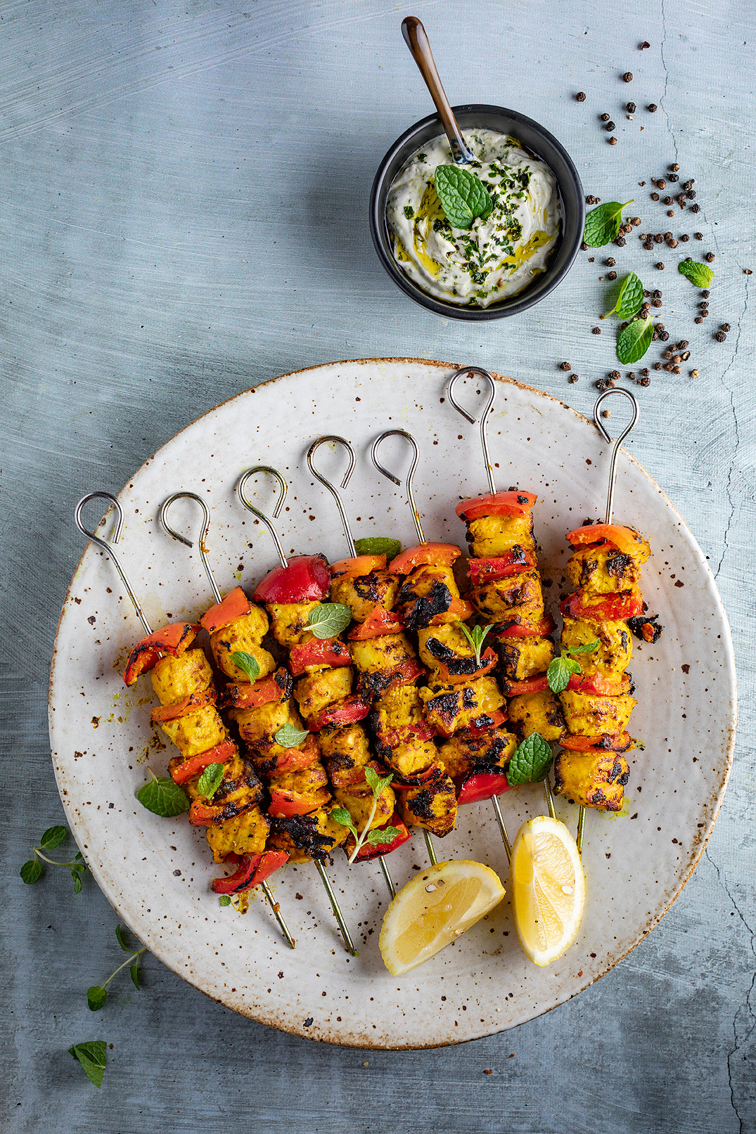 Turmeric, black pepper chicken kebabs with quinoa tabouli